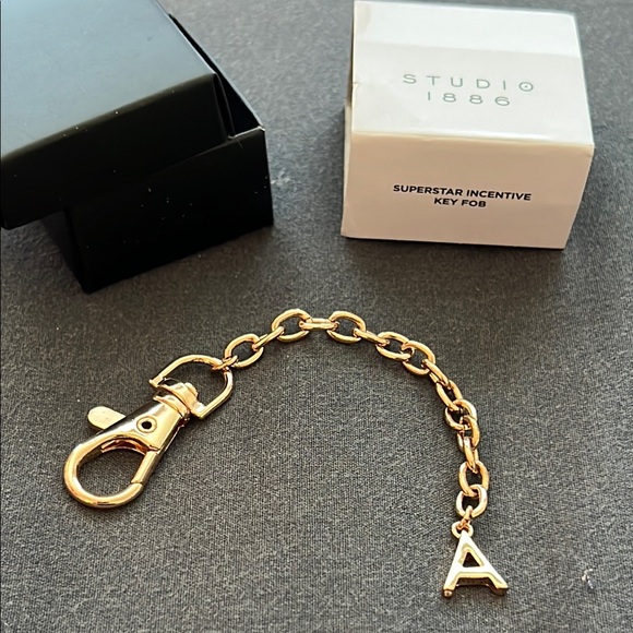 Avon Accessories - Avon Studio 1886 superstar incentive key fob A